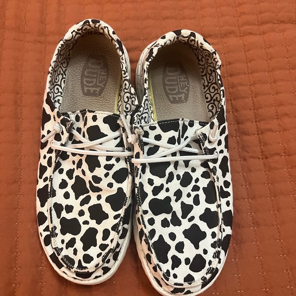 Women’s Cow print HeyDudes